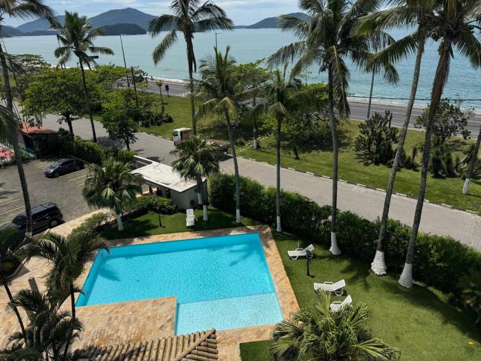 Cobertura Duplex frente Praia Massaguaçu 6 pessoas com vista e piscina