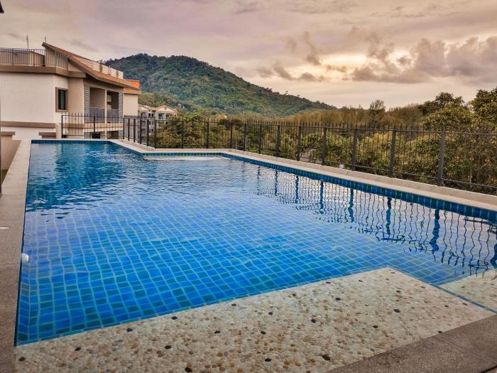 Apartments pool view in Title Residence Naiyang