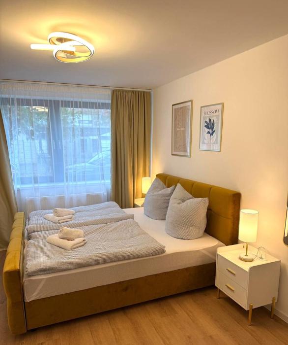 Moderne, komplett eingerichtete Wohnung mit Parkplatz & 24h Check-in