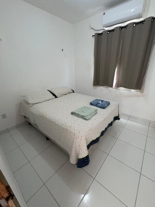 Quarto privativo e aconchegante em ambiente compartilhado