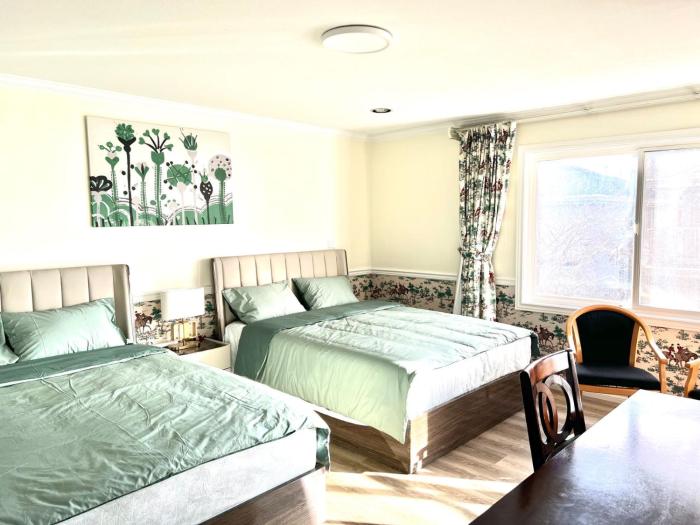 Spacious Bedroom with Two Queen Sized Bed