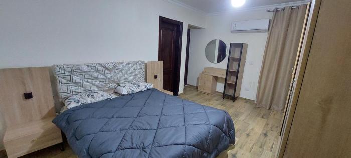 Fully finished 3-bedroom, 3-bathroom apartment with garden view in Jana Compound, Sheikh Zayed near Hyperone