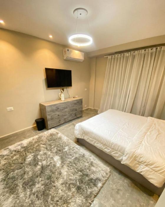 شقة غرفتين فرش جديد في بيفرلي هيلز الشيخ زايد مصر Two-bedroom apartment with new furniture in Beverly Hills Sheikh Zayed Egypt