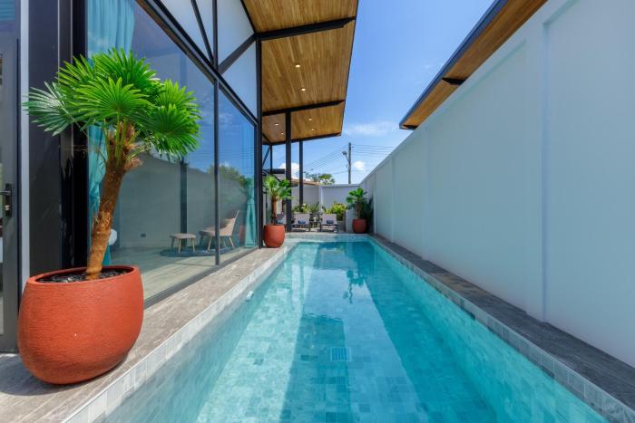 Modern 4-Bedroom Solar Villa with Pool & Game Zone at Sunset Garden 15
