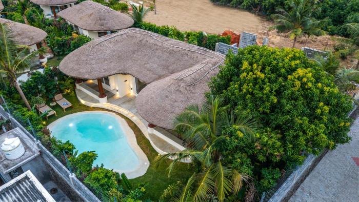 ELIVAAS Mallai Suites with Lush Lawn, Plunge Pool and Sit-Outs