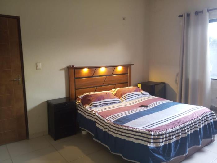 habitación cómoda con baño en suite y servicio de taxi