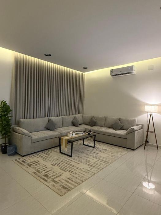 شقة بغرفة معيشة وغرفة نوم