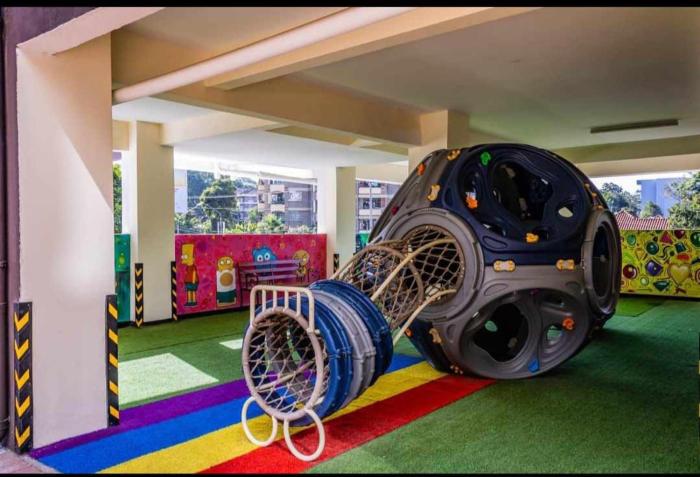 Affordable living two bedroom apartment with fully equipped gym ample parking space heated swimming pool children playing ground and amazing scenic views