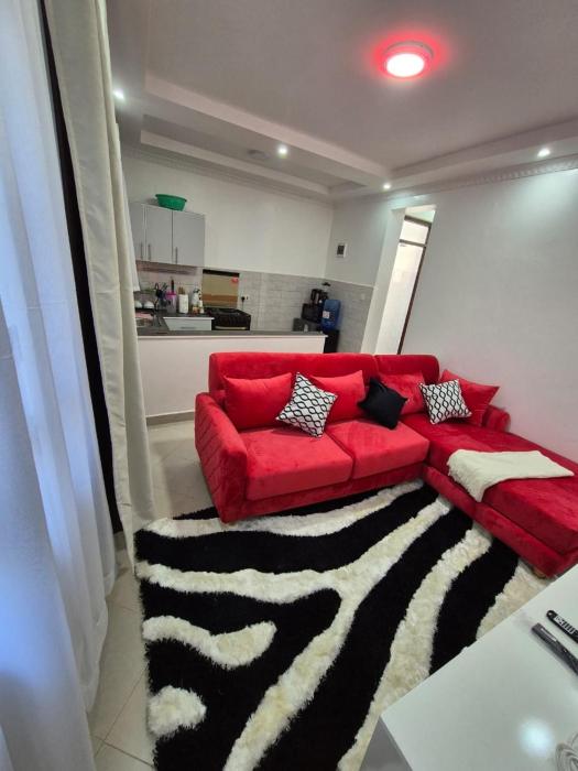 CM Snug stay -Naivegas Apartments