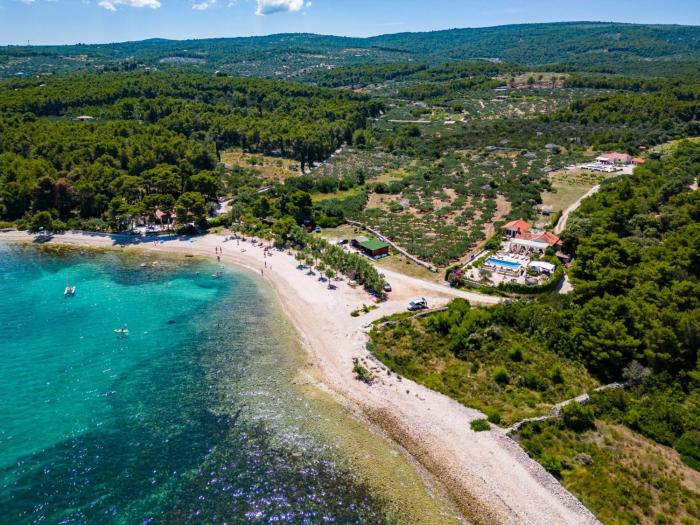 Beachfront House Mir with private pool and jacuzzi right at the beach in beautiful bay in Mirca - Brac