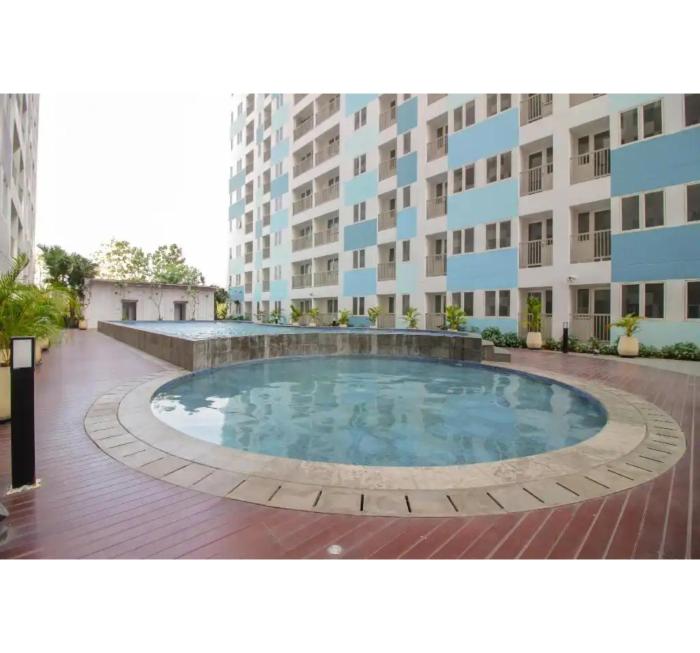 OYO Life 93139 Apartemen Grand Sentraland By Evi