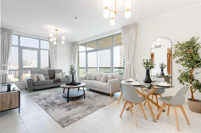 Stylish 1BR Retreat with Pool and Stunning City View