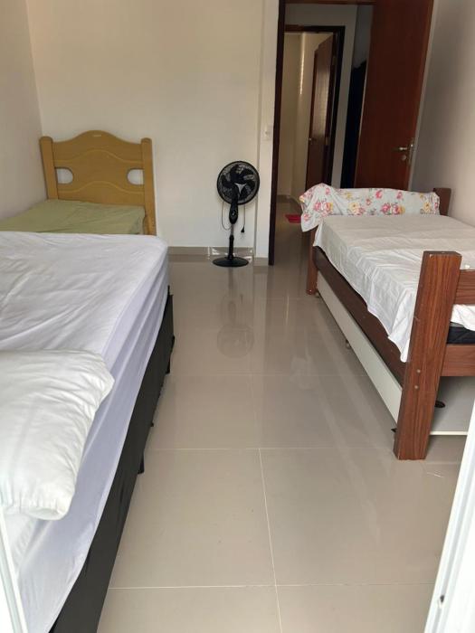 Quarto na Praia das Palmeiras