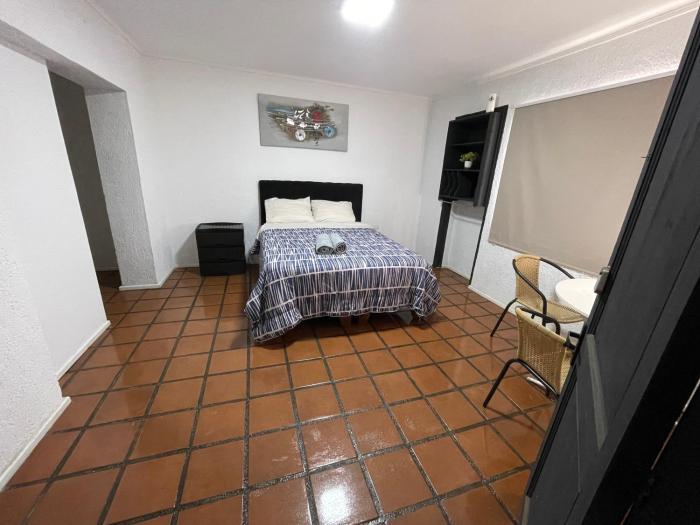 Habitación doble superior en el centro, con baño