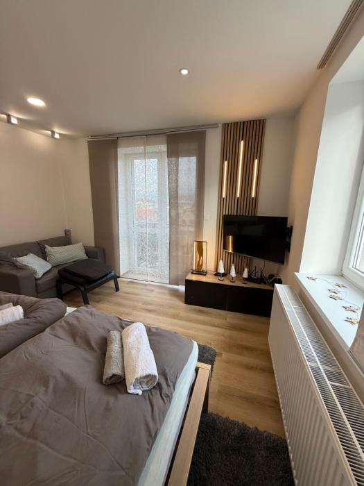 Plně vybavený krásný apartmán 1kk s balkonem, výhledem