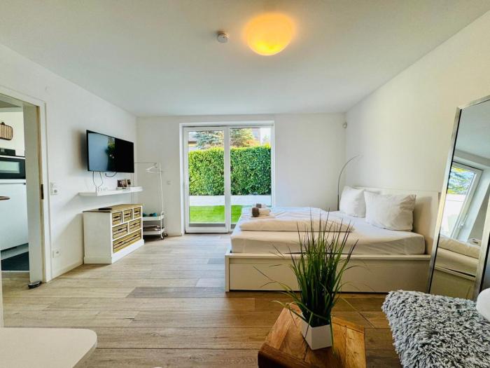 Helle Ferienwohnung mit Garten in ruhiger Lage Nähe Main und City