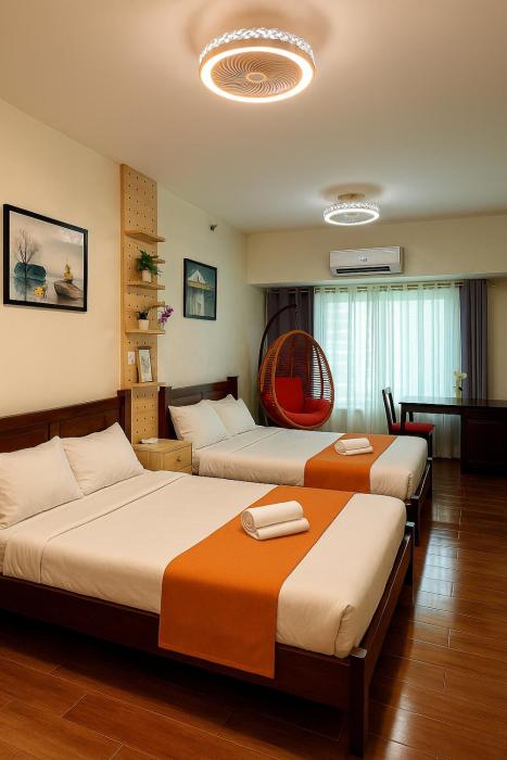 Relaxing Escape 2 Beds Rattan Chair & 65 inch Smart TV