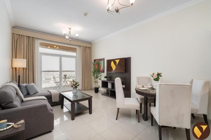 Vogue Vacation Homes, Arjan Siraj Tower near Miracle Garden and Dubai Hills Mall, One Bedroom Apartment with Large Balcony and City View, Access toAmenities