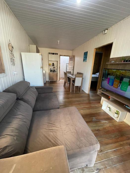 Casa pé na areia em capão da canoa