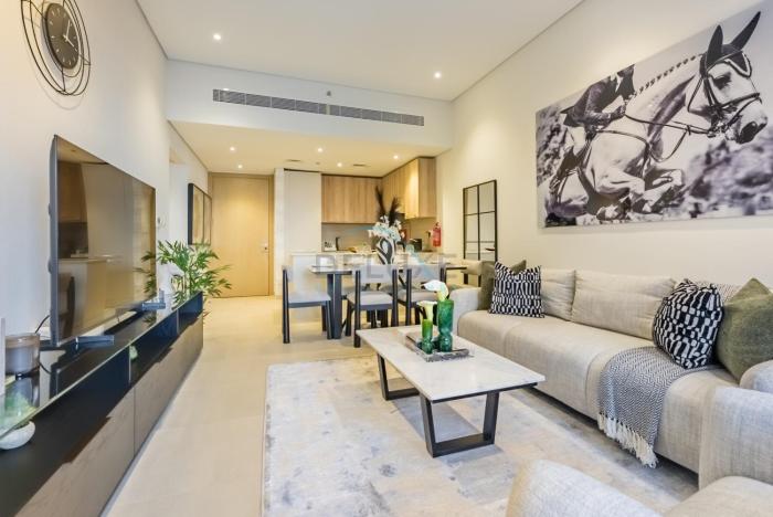 Balcony-Facing Pool 2BR with Assistant Room, Minutes Walk to Park, Miracle and Butterfly Garden, Divine Living, Arjan by Deluxe Holiday Homes