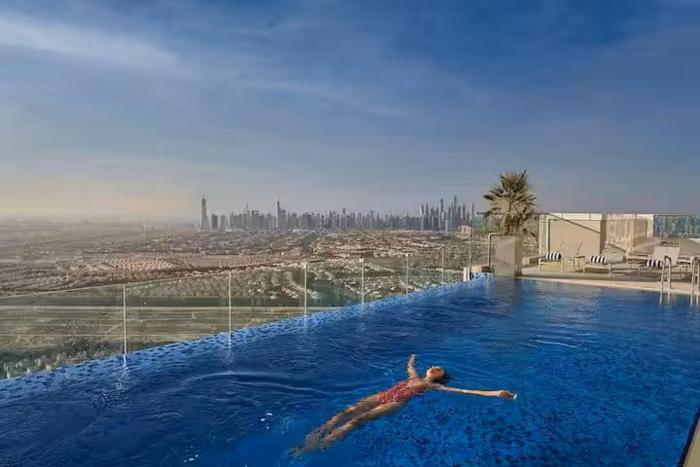 Vogue Vacation Homes, Novotel Residences JVT near Springs Souk Mall, One Bedroom apartment with Balcony and Vibrant Community View, Access toAmenities