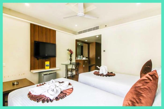 HOTEL ROYAL C-DIVYA DHAM PALACE - Near Shree Kashi Vishwanath Temple - Free Wi-Fi and Parking Facilities , Fully Air Conditioned Hotel - Comfortable & Serene Stay Near Spiritual Destinations