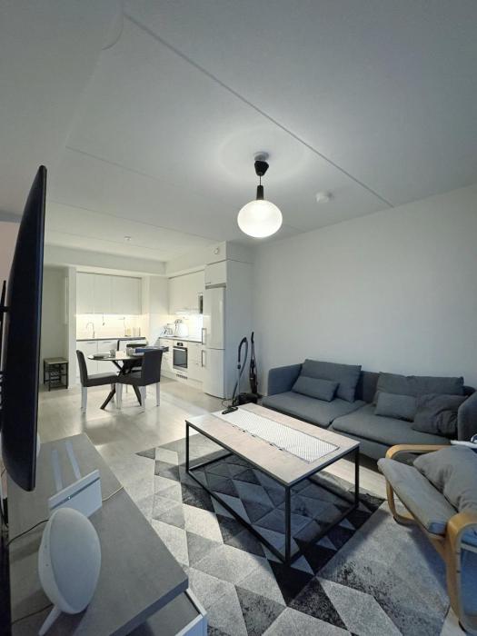 New one bedroom with terrace close to airport