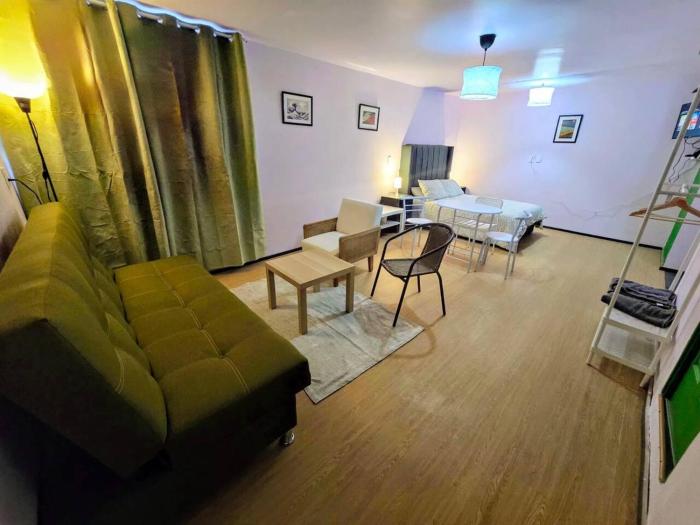 Suite Verde amplia para 4 huéspedes Espacios cómodos, diseño relajante y ubicación céntrica