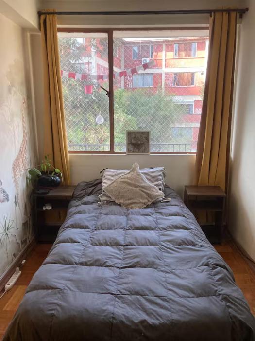 Acogedora habitación en duplex con vista a parque