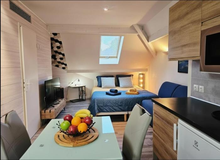 Studio sous les toits - Plage & Parking privés