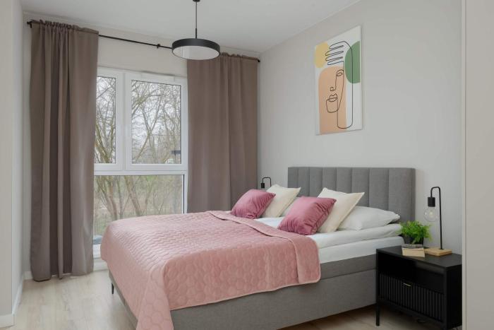 Modern & Bright Apartment Marywilska in Warsaw with Parking by Noclegi Renters