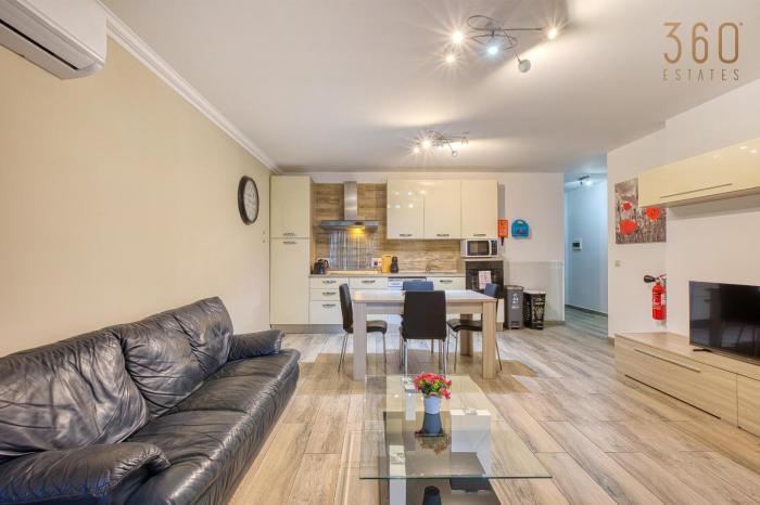 A lovely 2BR home, fully equipped with WIFI & AC by 360 Estates