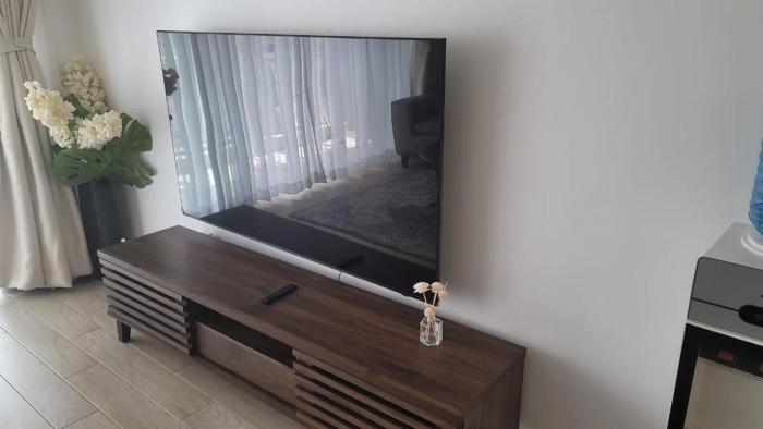 Elegant 2-Bedroom Apartment with Pool & Balcony