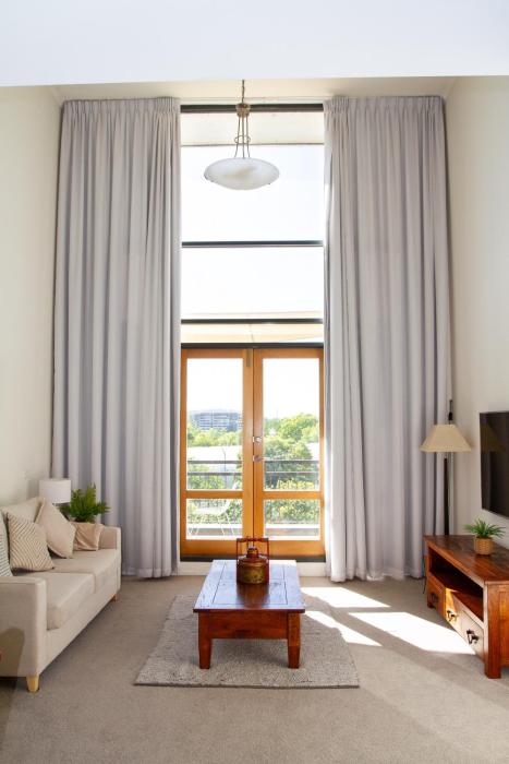 Loft-Style CBD 1-Bed with Rooftop Terrace & BBQ