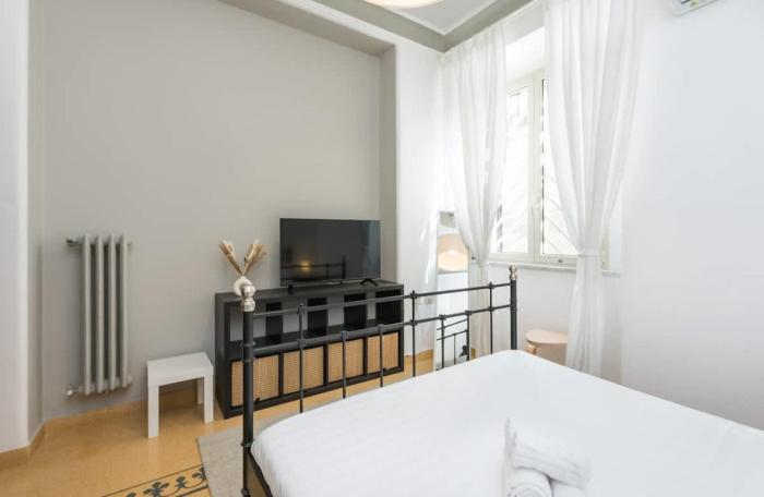 4 comodi posti letto con giardino al Colosseo