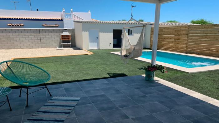 Alojamiento con piscina, cercano a la playa y barbacoa ideal para familias