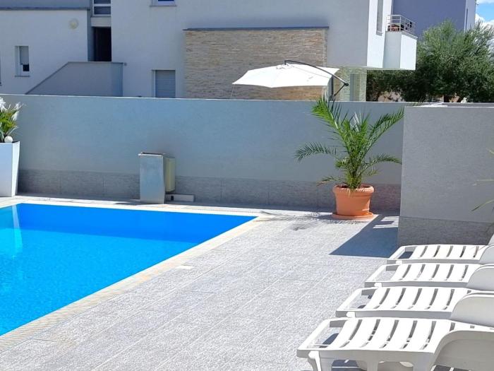 Apartment Erdgeschoss-Ferienwohnung mit Garten und Pool by Interhome