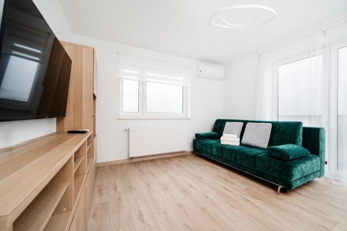 Piłsudskiego Homely Apartment by BookingHost