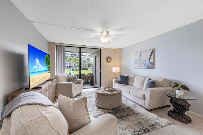 Walkout condo with beach access, pool and pickleball