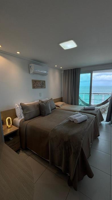 Flat Charmoso Beira-mar