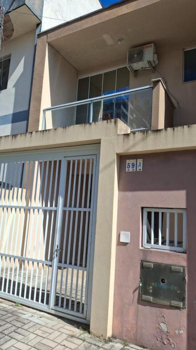 Casa aconchegante a poucos metros da praia