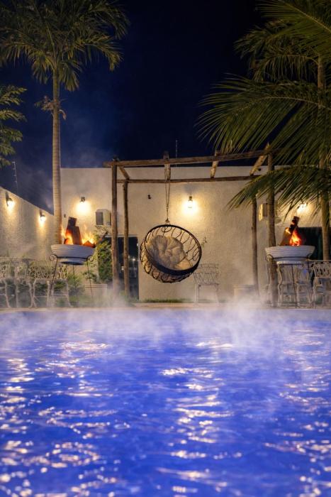 A Casa Paradisíaca ll Luxo Piscina Super Mega Quente até 50 graus Aquecimento Elétrico e Solar Casa com Sauna a Vapor e Ar Condicionado em Todos Ambientes e Lavanderia com Roupa de Cama e Banho e ofurô aquecido até 40 graus, com adicionais