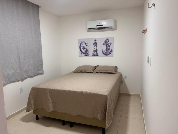 Suite 05 em casa Beira mar, com ar condicionado , cozinha completa com Micro ondas air fryer forno elétrico fogão Geladeira freezer gelagua e cafeteira elétrica Tudo para vc se sentir em casa além de um Deck com churrasqueira vista mar