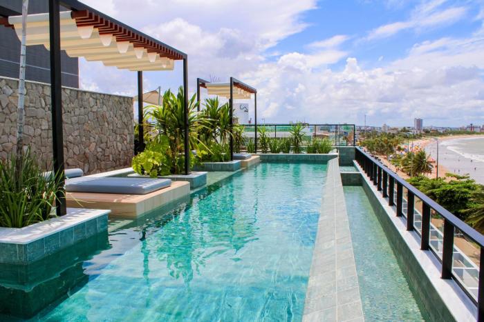 Flat Studio com Jacuzzi - By Living