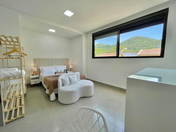 Studio aconchegante com vista para as montanhas