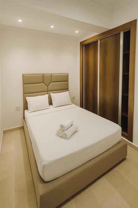 Appartements à 1 min de la gare TGV-fibre-climatiseur-parking-1min de la corniche et Mall city center