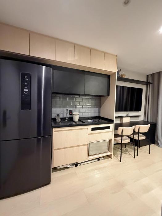 Studio confortável com espaço Home Office