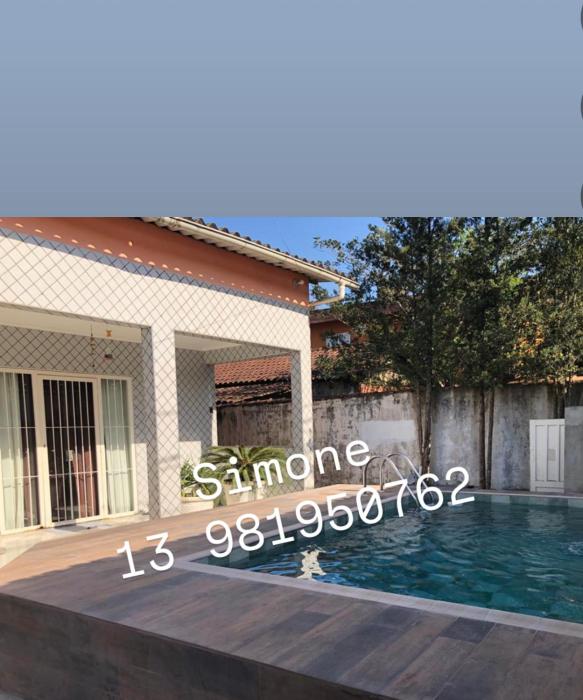 Casa espaçosa com Piscina e Churrasqueira 2 dorm