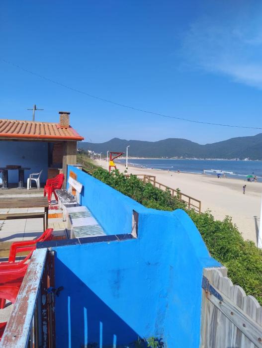 casa de praia com piscina frente a praia