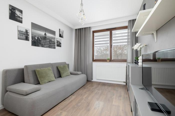 White and Grey Apartment in Cracow with Parking by Noclegi Renters